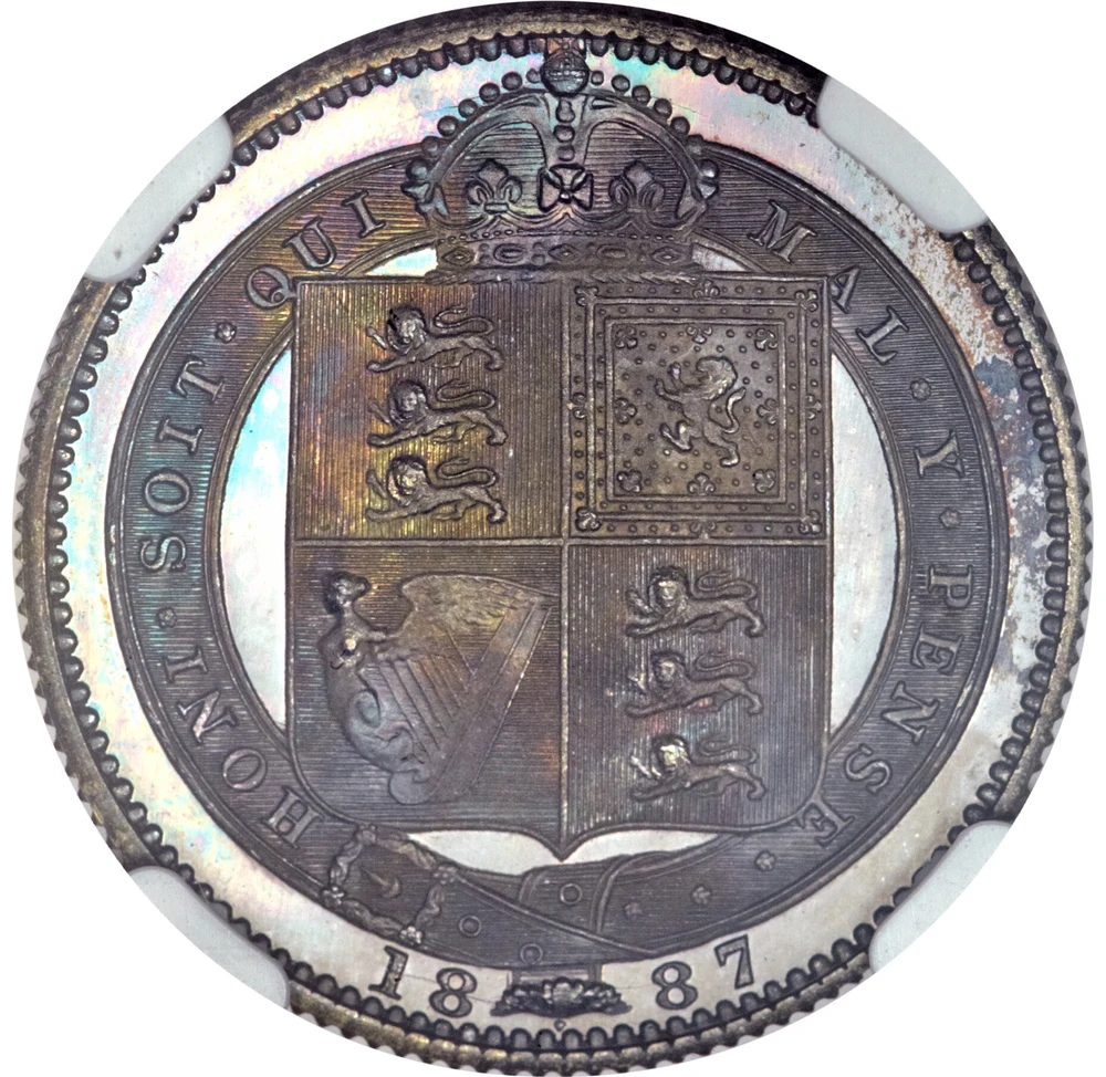 British Silver Shilling — 1816–1919 reverse: 1887 crowned arms within order chain