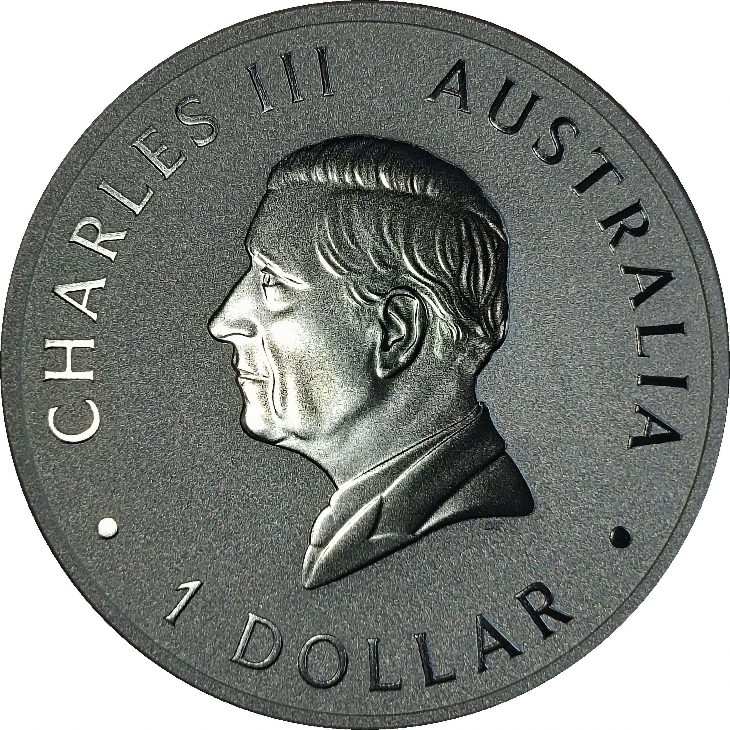 2025 Australian Silver Kookaburra — Matching 2024–2026 One-Ounce Bullion obverse: Charles III portrait and 1 DOLLAR