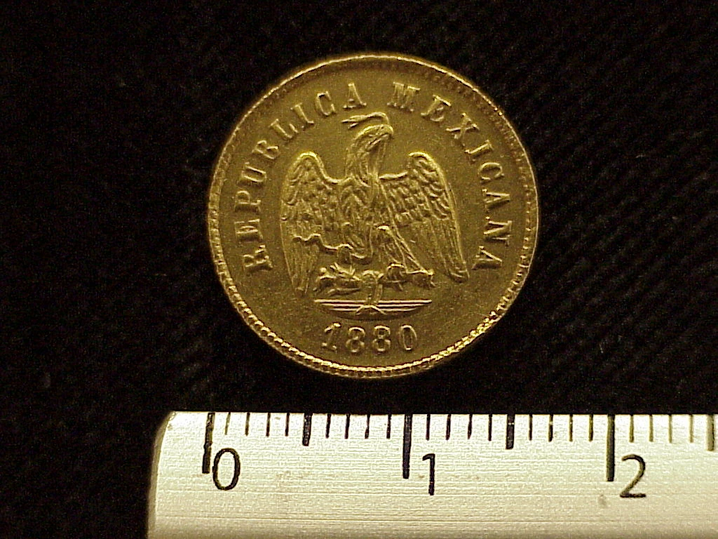Obverse of a Mexican 1880 gold two-and-a-half pesos coin showing the national eagle and date.
