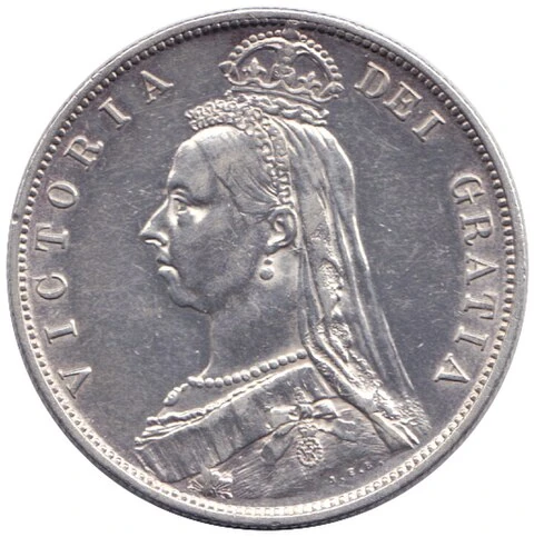 1887 British sterling half-crown obverse — Victoria’s Jubilee bust faces left, wearing a small crown, veil, necklace and earrings.