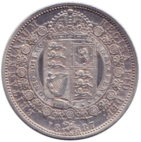1887 British sterling half-crown reverse — Crowned quartered royal arms sit within an ornate order chain, with the issue date 1887 below.