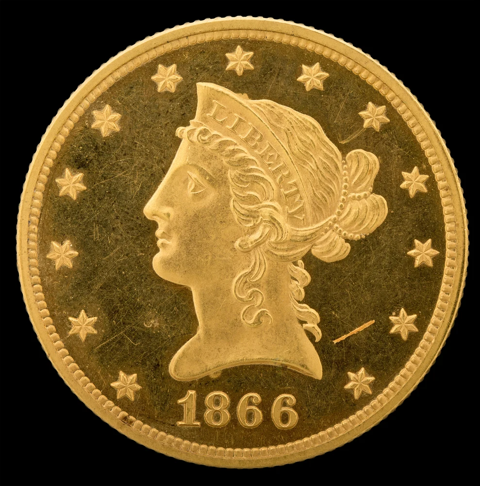 Liberty Head Eagle — $10 obverse — 1866 Liberty Head eagle with motto; earlier portrait/reverse subtypes differ