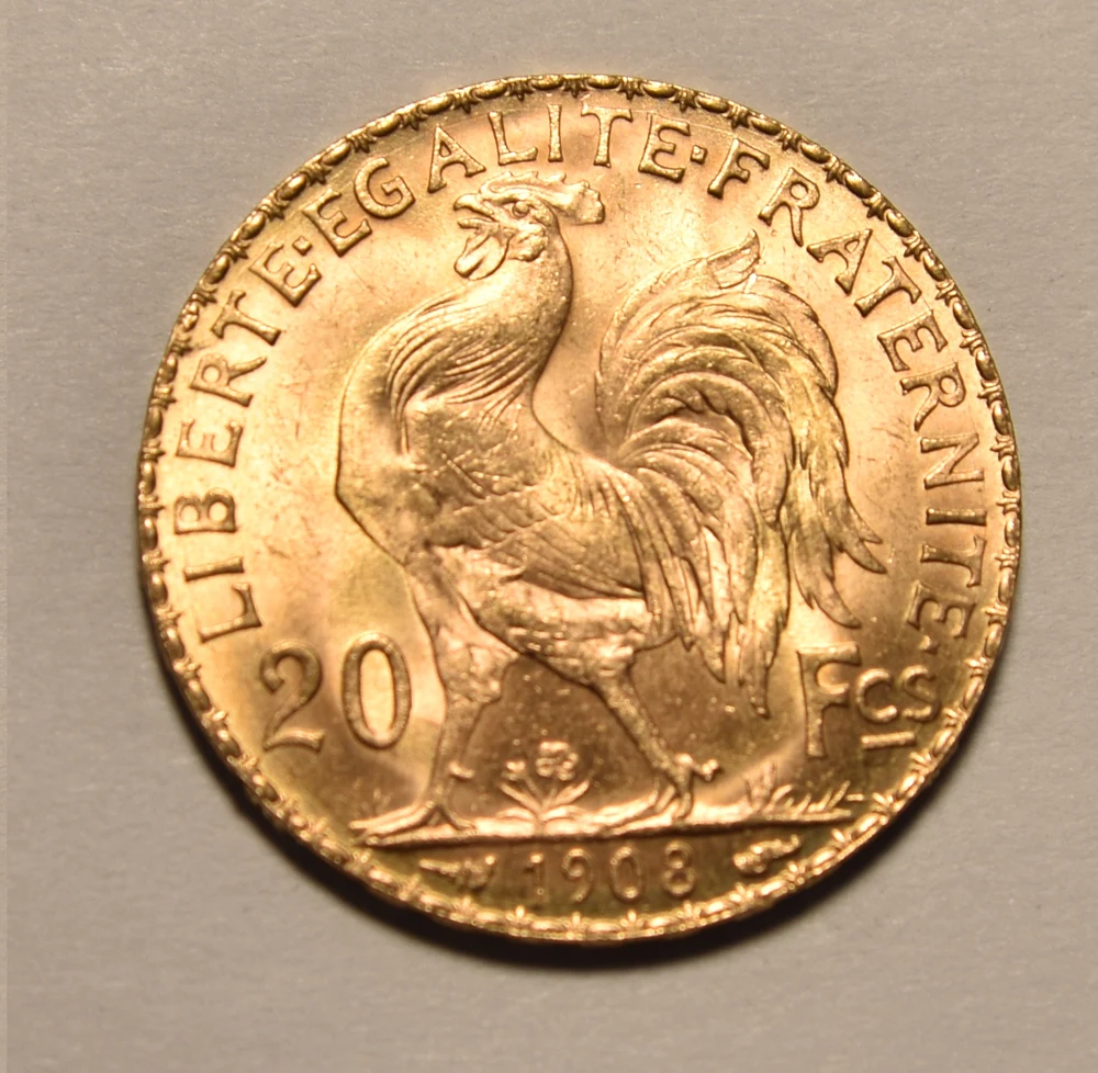 French Marianne Rooster Gold 20 Francs reverse — 1908 twenty-franc Marianne/Rooster reference. The face date cannot establish original striking versus an official later restrike.